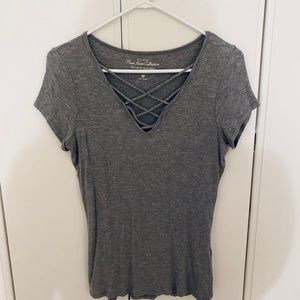 grey v neck shirt